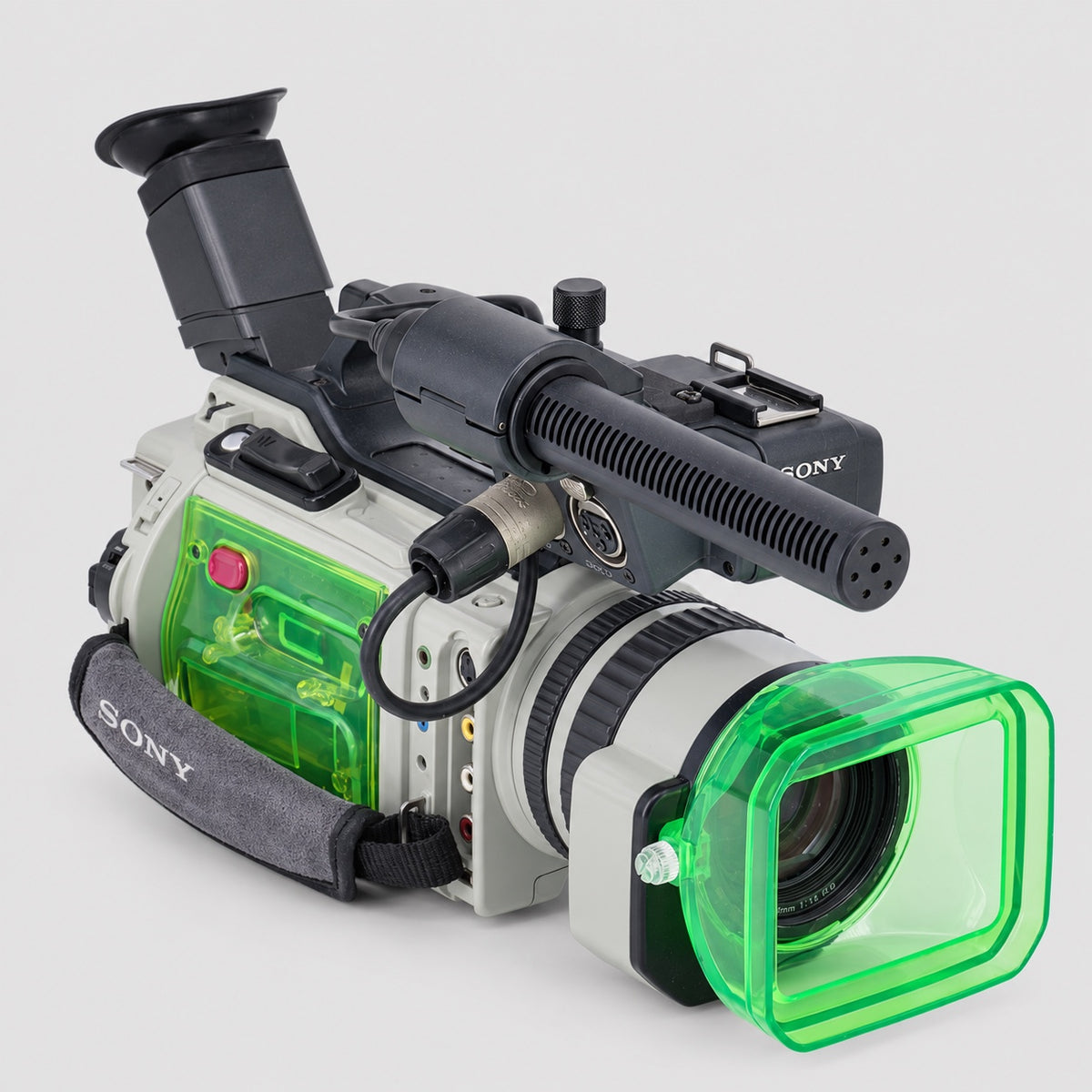 INVIZ PD150 Game Boy 1/1 custom camcorder, front lens view with translucent green lens hood